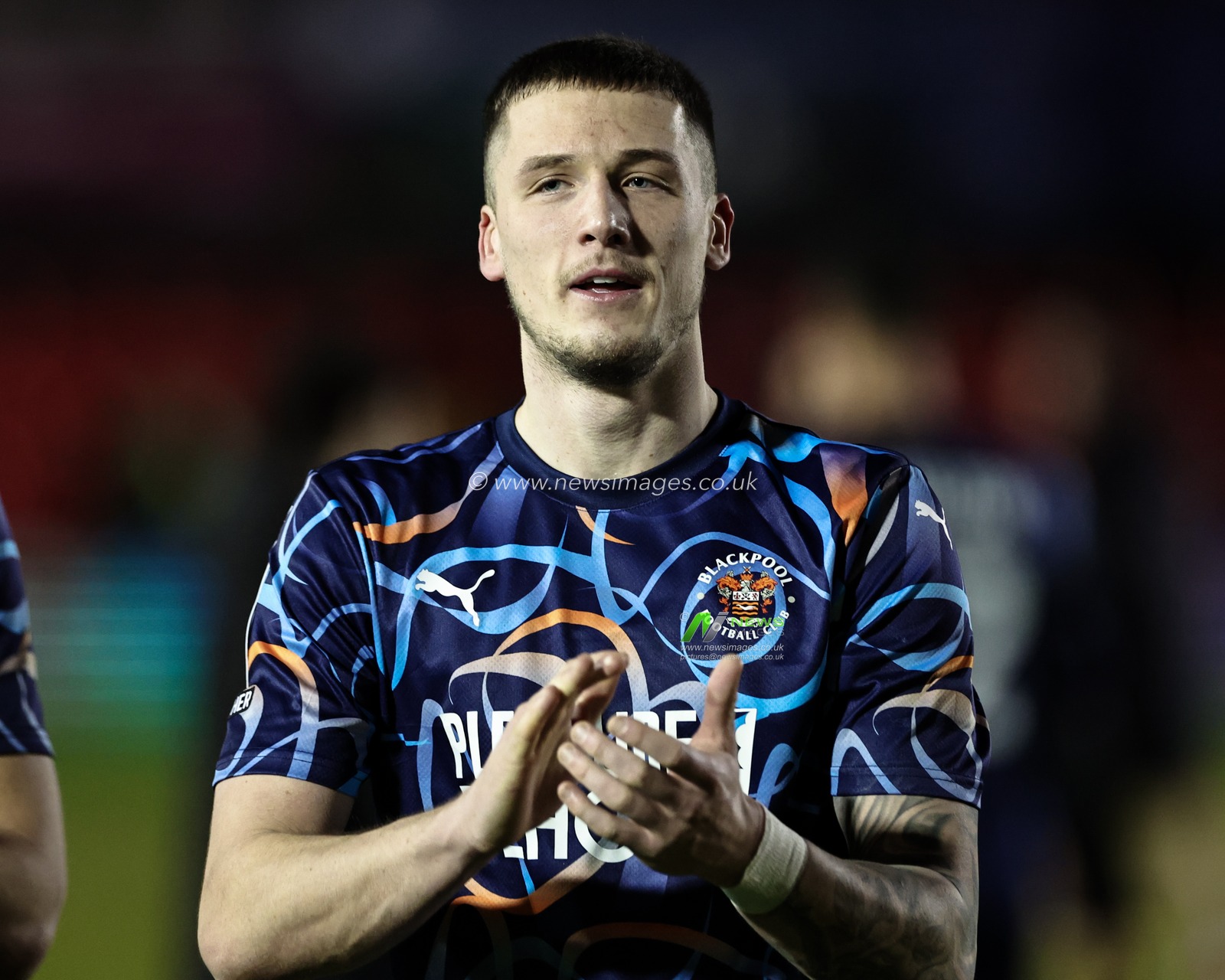 Oliver Casey of Blackpool applauds the fans after the final whistle during the Sky Bet League 1 match Lincoln City vs Blackpool at Gelder Group Sincil Bank Stadium, Lincoln, United Kingdom, 28th January 2025

(Photo by Mark Cosgrove/News Images)