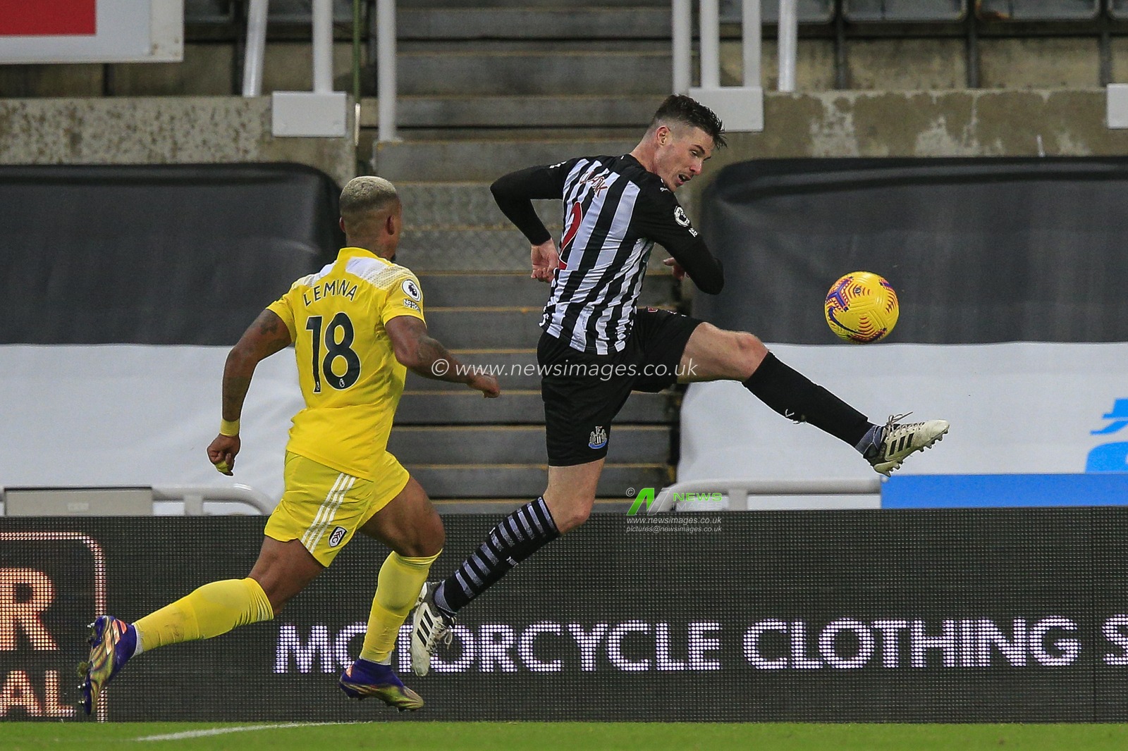 Ciaran Clark #2 of Newcastle United clears the ball from the Newcastle United penalty area