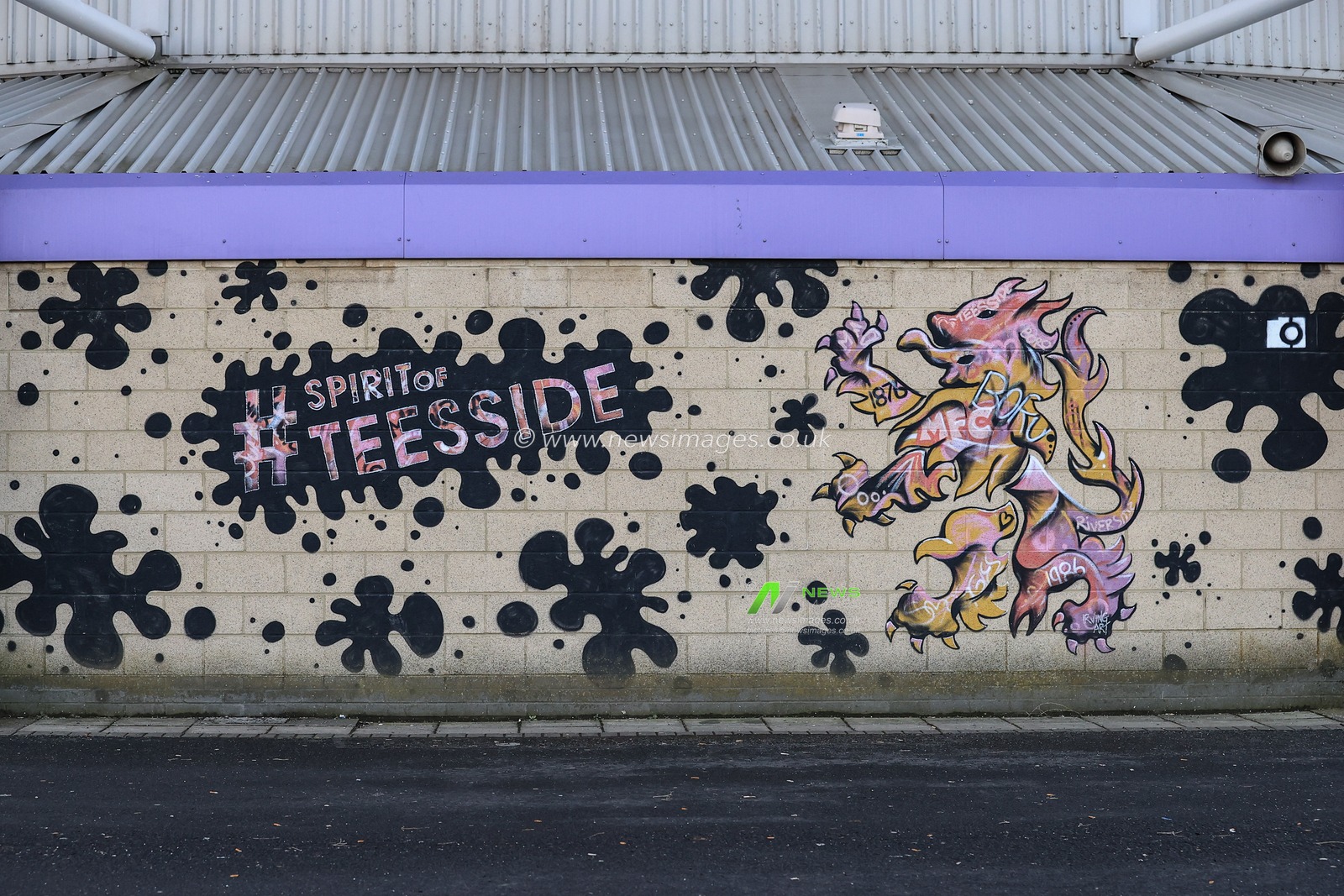 A mural on the wall for the Riverside Stadium
