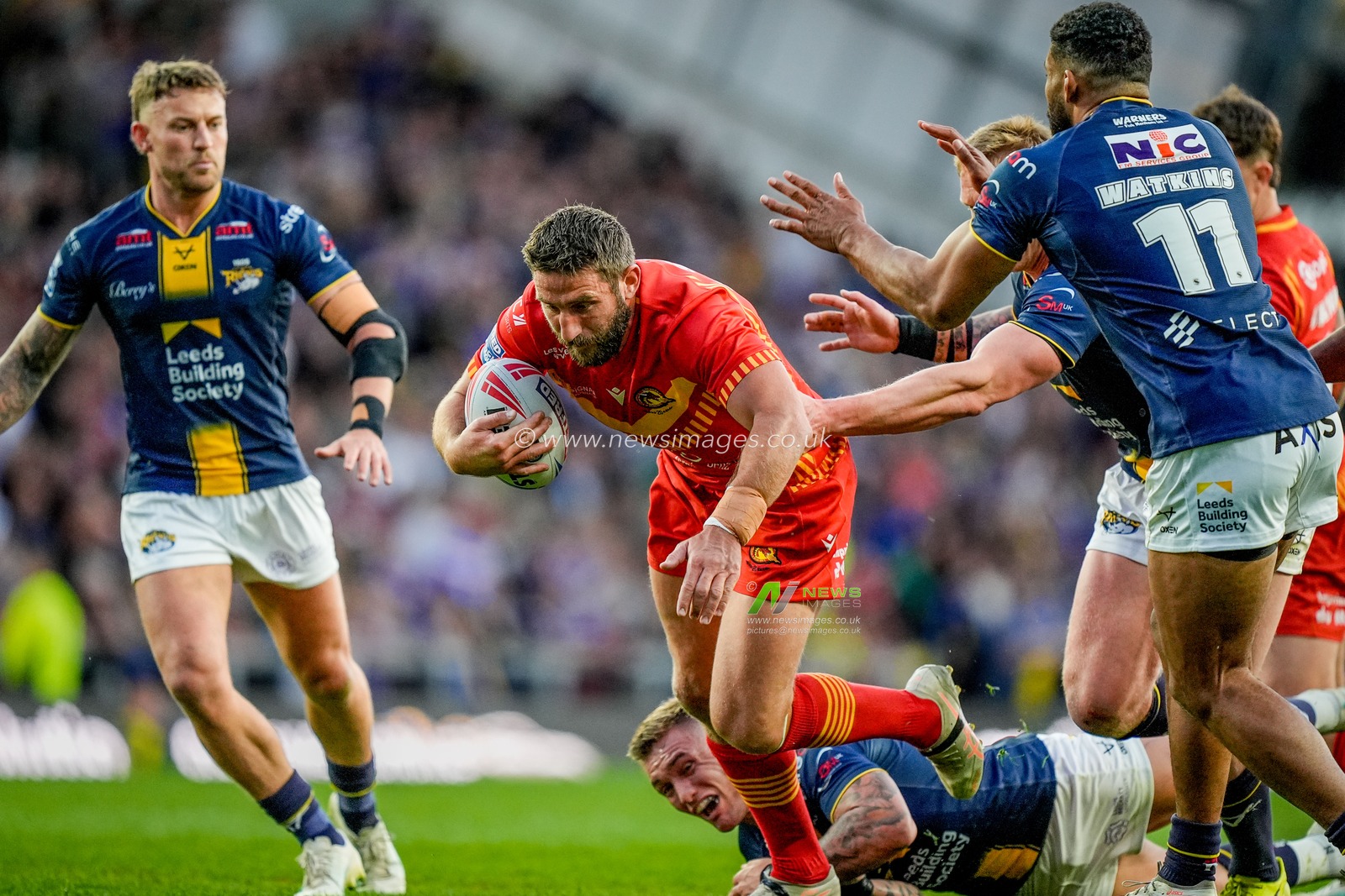 Julian Bousquet of Catalans Dragons is tackled by Danny Levi of Leeds Rhinos during the Betfred Super League round 9 match Leeds Rhinos vs Catalans Dragons at AMT Headingley Stadium, Leeds, United Kingdom on 24 April 2026

(Photo by Maynard Manyowa/News Images)