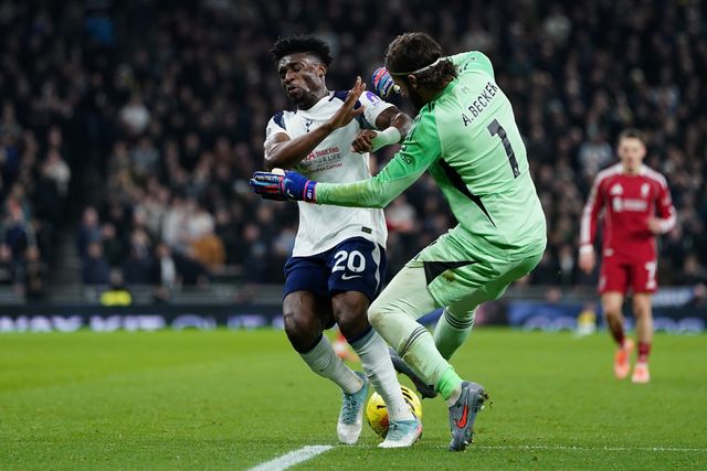 Mohammed Kudus of Tottenham Hotspur and Alisson Becker of Liverpool during the Premier League match Tottenham Hotspur vs Liverpool at Tottenham Hotspur Stadium, London, United Kingdom, 20th December 2025

(Photo by Harvey Murphy/News Images)

*** GER AUT SUI OUT ***