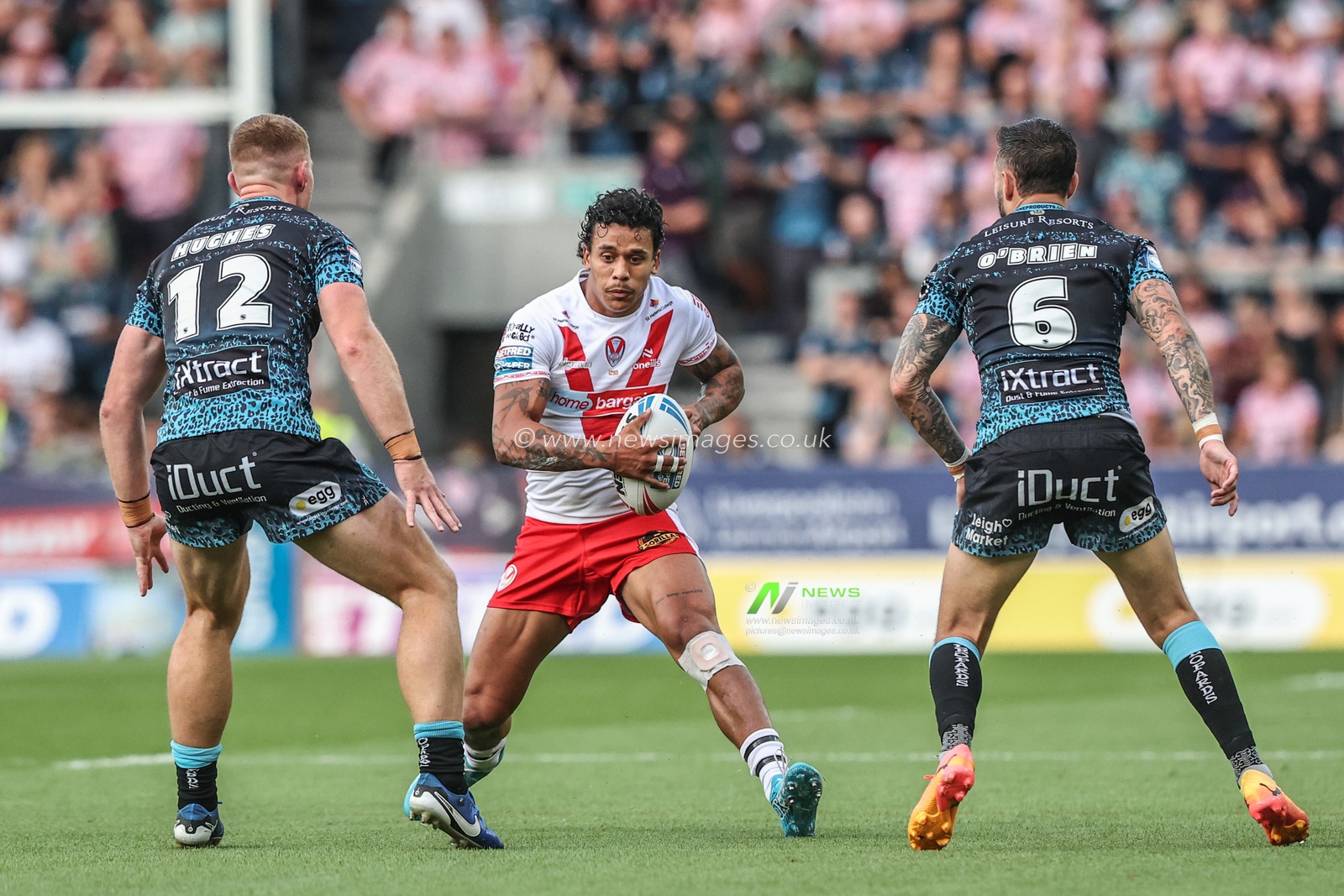 Tristan Sailor of St. Helens is tackled during the Betfred Super League round 19 match St Helens vs Leigh Leopards at Totally Wicked Stadium, St Helens, United Kingdom, 17th July 2025

(Photo by Alfie Cosgrove/News Images)