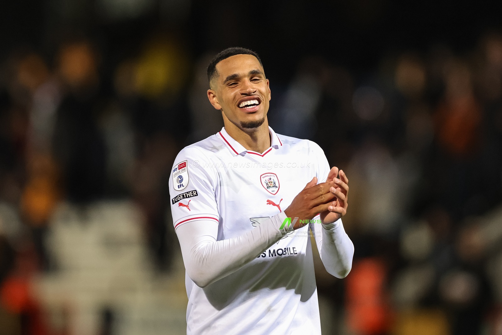 Goalscorer Jon Russell #3 of Barnsley applauds the traveling fans during the Sky Bet League 1 match Cambridge United vs Barnsley at Abbey Stadium, Cambridge, United Kingdom, 3rd October 2023

(Photo by Mark Cosgrove/News Images)