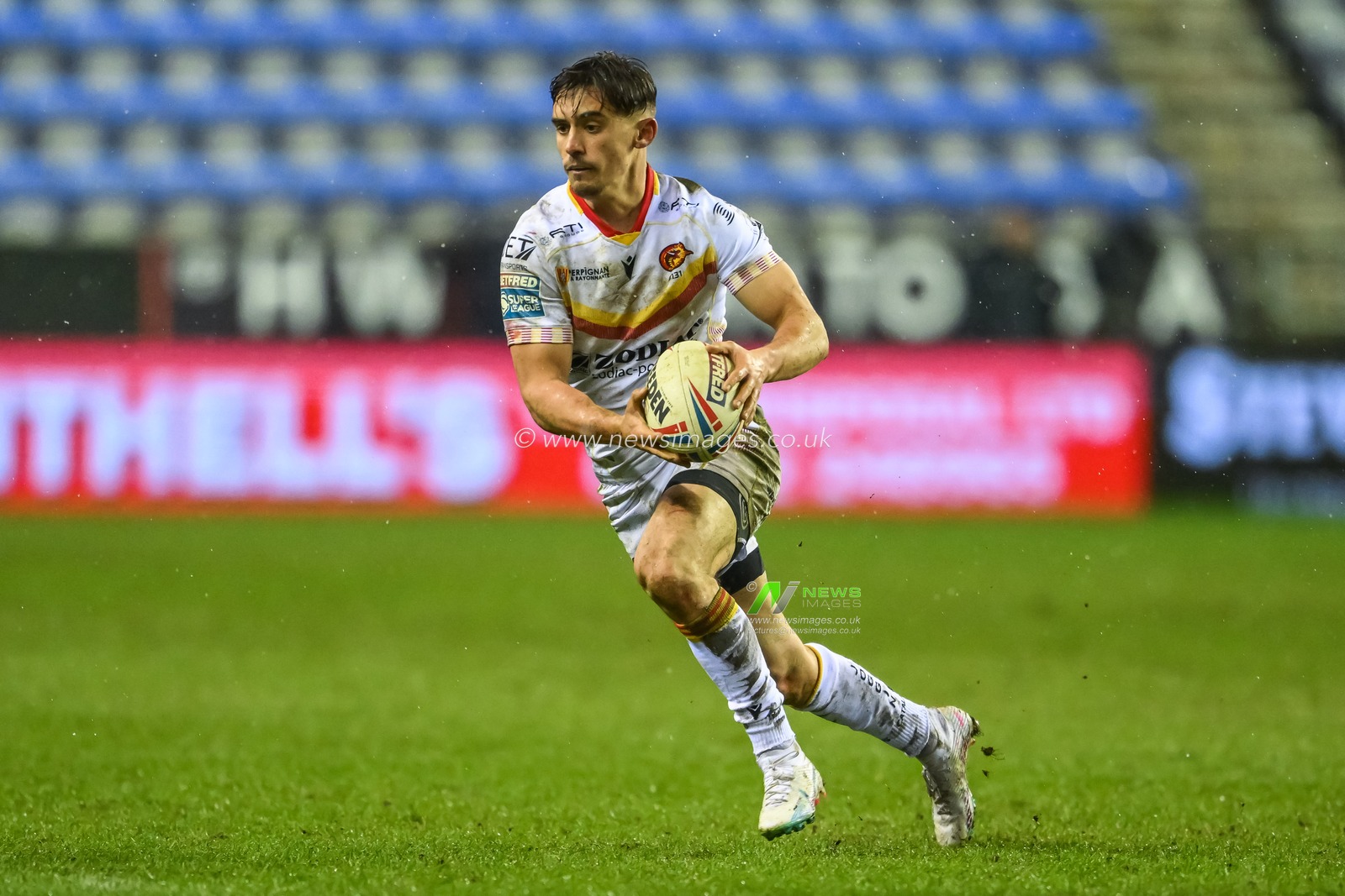 Arthur Mourgue #1 of Catalans Dragons makes a break during the Betfred Super League Round 4 match Wigan Warriors vs Catalans Dragons at DW Stadium, Wigan, United Kingdom, 9th March 2023

(Photo by Craig Thomas/News Images)