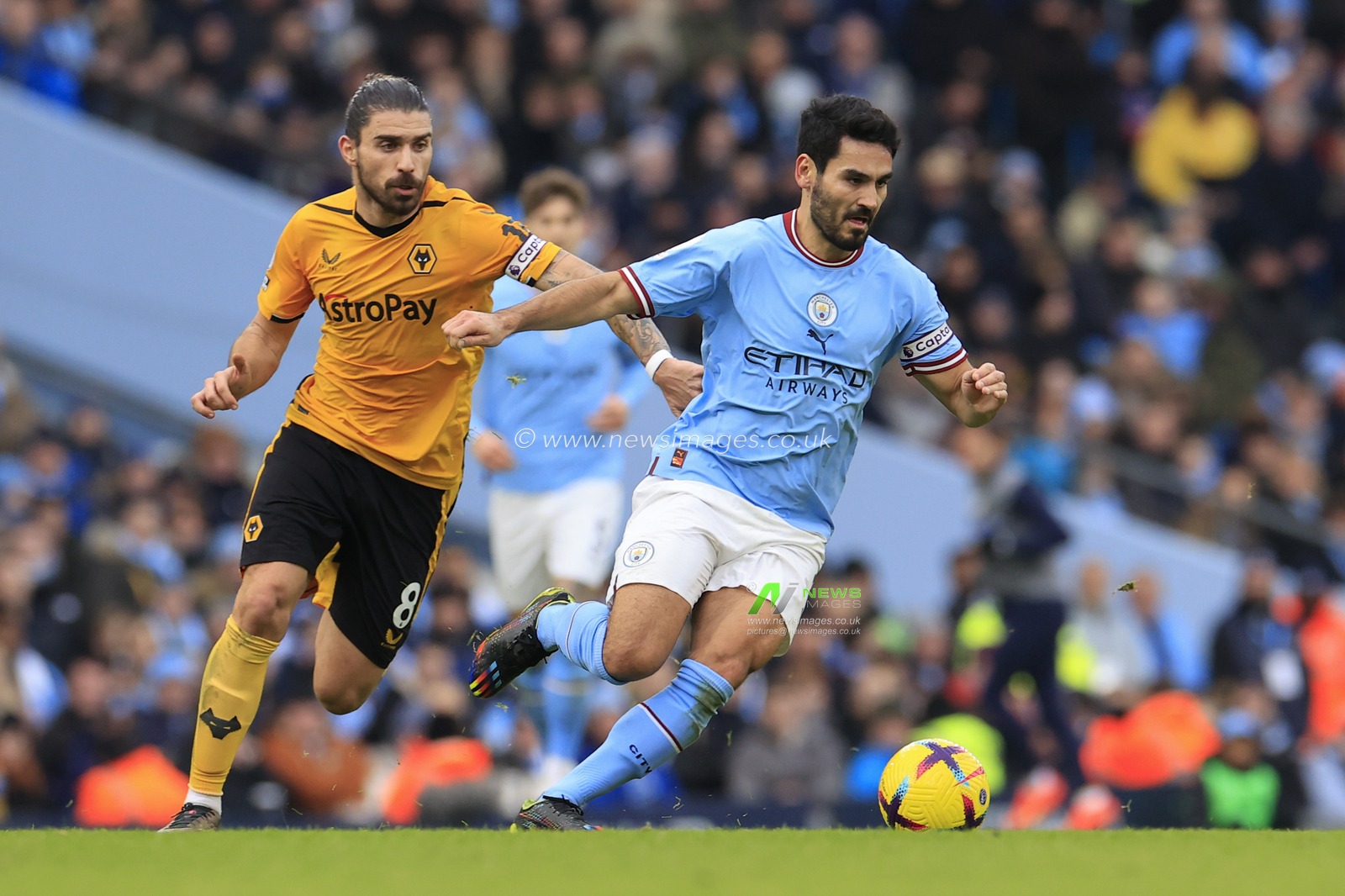 Ilkay Gundogan #8 of Manchester City runs from Ruben Neves #8 of Wolverhampton Wanderers during the Premier League match Manchester City vs Wolverhampton Wanderers at Etihad Stadium, Manchester, United Kingdom, 22nd January 2023

(Photo by Conor Molloy/News Images)