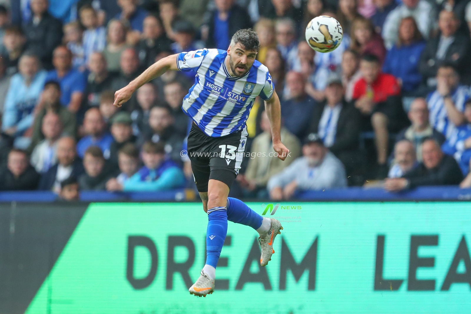Callum Paterson #13 of Sheffield Wednesday heads the ball during the Sky Bet League 1 Play-off match Sheffield Wednesday vs Peterborough at Hillsborough, Sheffield, United Kingdom, 18th May 2023

(Photo by Gareth Evans/News Images)