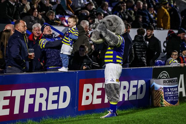 Warrington mascot ‘Wolfie’ takes photos with fans during the Betfred Super League Round 3 match Warrington Wolves vs Wakefield Trinity at The Halliwell Jones Stadium, Warrington, United Kingdom on 28 February 2026

(Photo by Alfie Cosgrove/News Images)