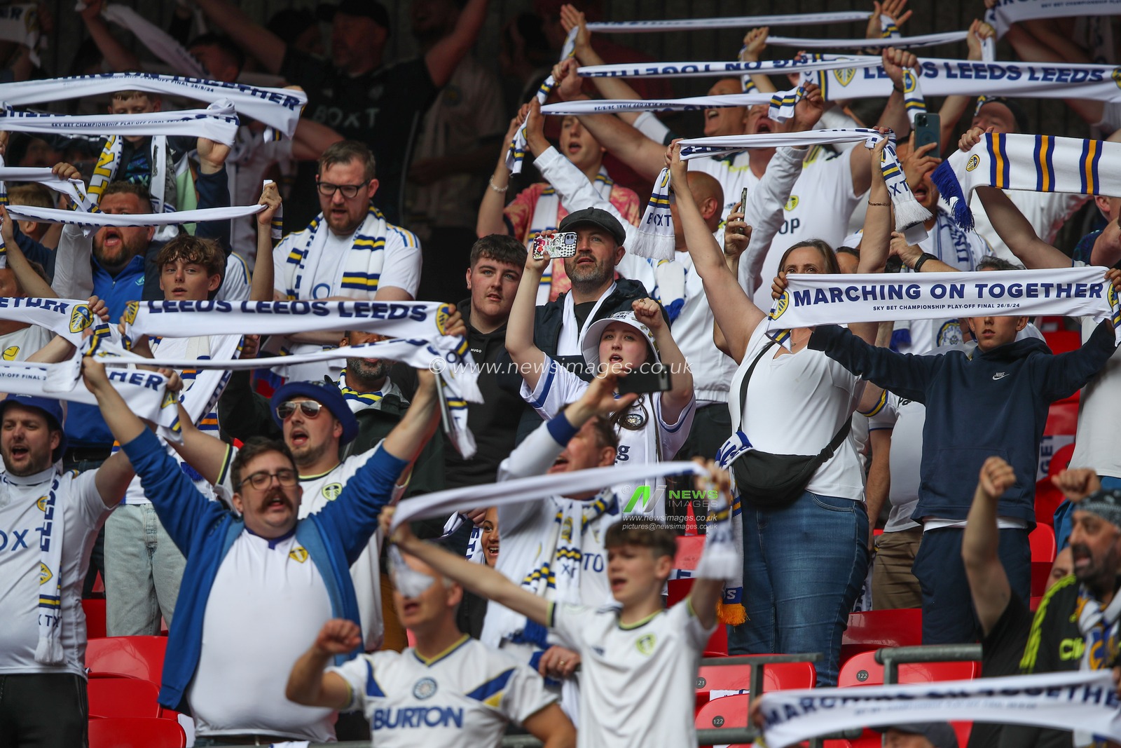 Leeds fans holding up their scarves before the game during the Sky Bet Championship Play-Off Final match Leeds United vs Southampton at Wembley Stadium, London, United Kingdom, 26th May 2024

(Photo by Gareth Evans/News Images)