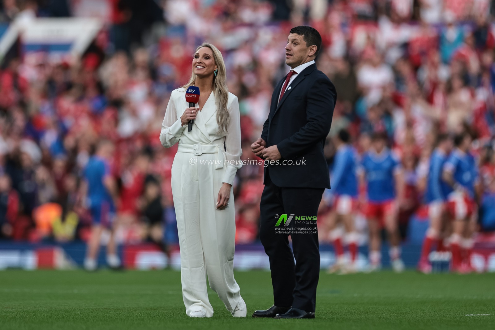 Jenna Brooks of Sky Sports interviews Matt Peet Head Coach of Wigan Warriors during the 2025 Betfred Super League Grand Final Hull KR v Wigan Warriors at Old Trafford, Manchester, United Kingdom, 11th October 2025

(Photo by Mark Cosgrove/News Images)