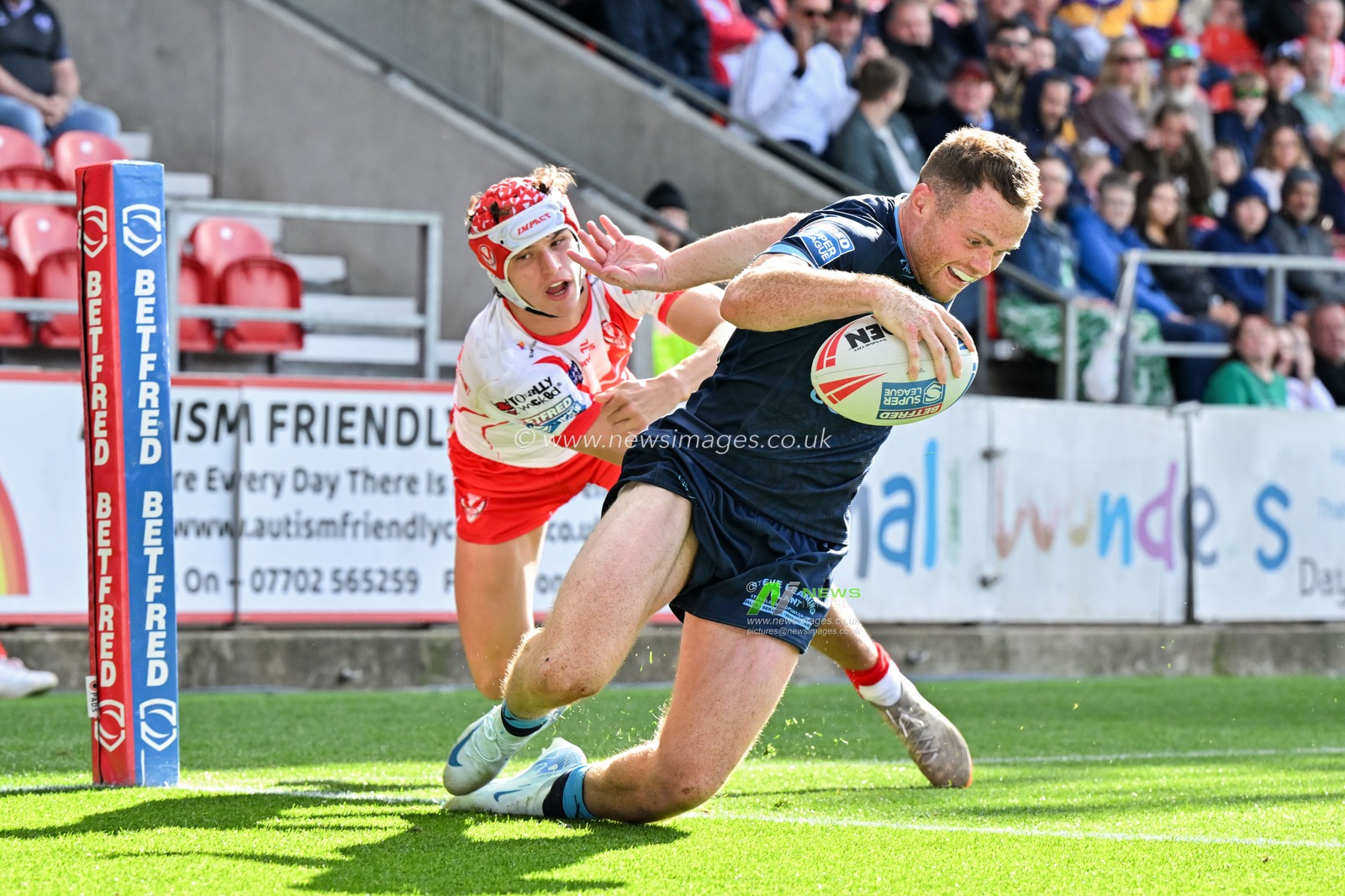Joe Burgess of Hull KR goes over for his fourth try to make it 6-36 Hull during the Betfred Super League Round 23 match St Helens vs Hull KR at Totally Wicked Stadium, St Helens, United Kingdom, 24th August 2024

(Photo by Cody Froggatt/News Images)