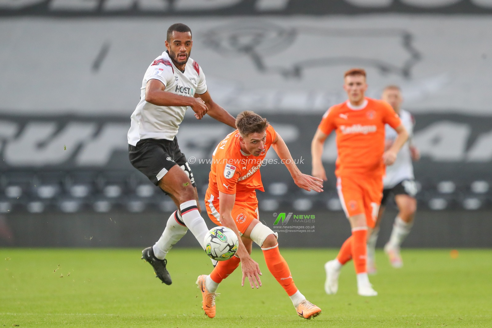Curtis Nelson #35 of Derby County and Jake Beesley #18 of Blackpool battle for the ball during the Carabao Cup match Derby County vs Blackpool at Pride Park Stadium, Derby, United Kingdom, 8th August 2023

(Photo by Gareth Evans/News Images)