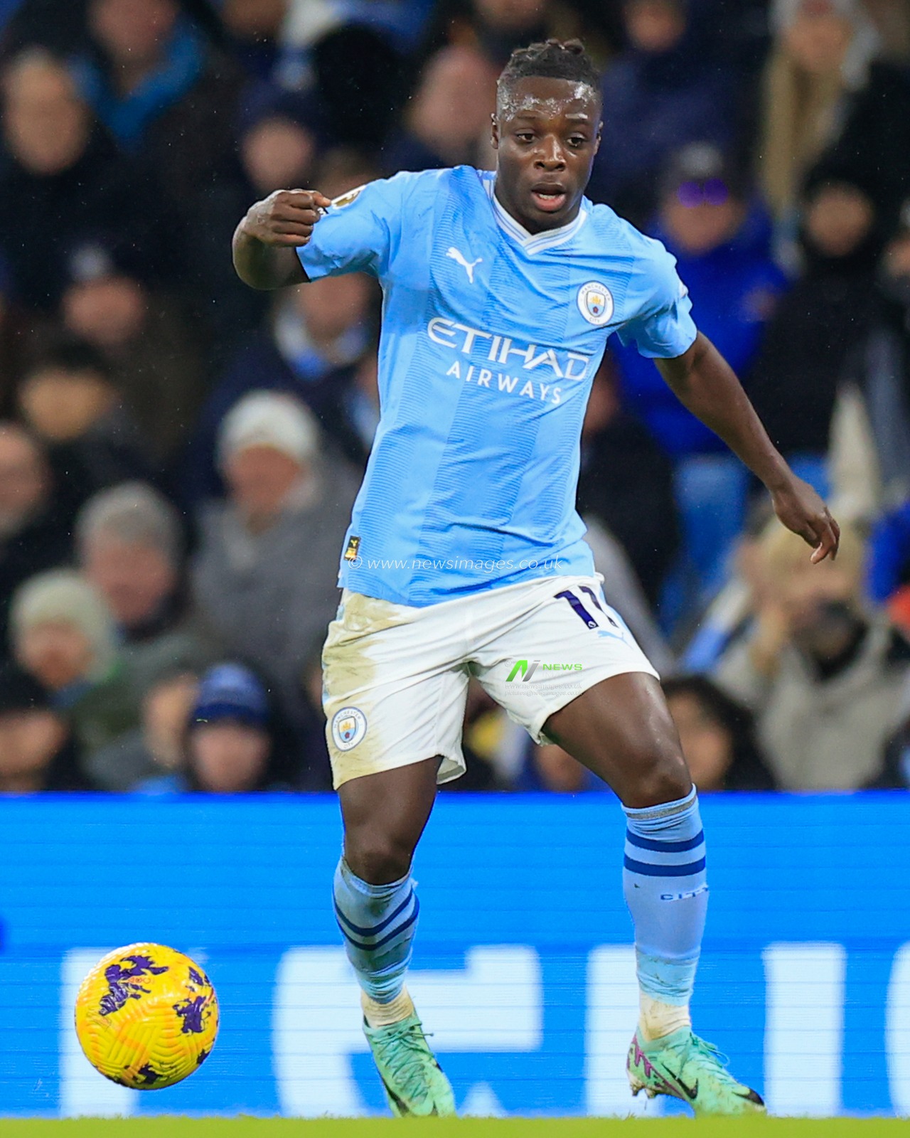 JÃ©rÃ©my Doku #11 of Manchester City in action during the Premier League match Manchester City vs Tottenham Hotspur at Etihad Stadium, Manchester, United Kingdom, 3rd December 2023

(Photo by Conor Molloy/News Images)