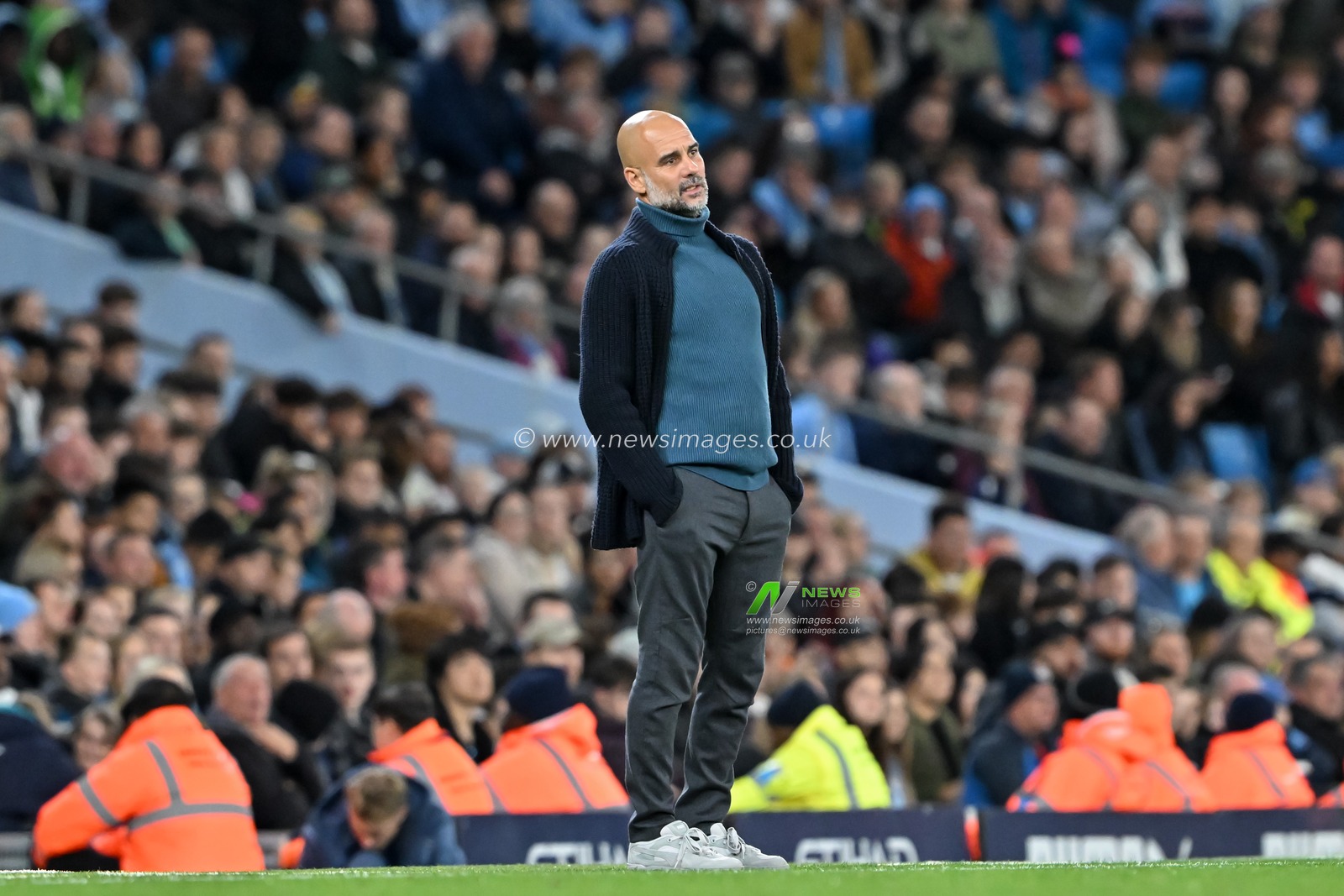 Pep Guardiola manager of Manchester City watches on during the Carabao Cup match Manchester City vs Watford at Etihad Stadium, Manchester, United Kingdom, 24th September 2024

(Photo by Cody Froggatt/News Images)
