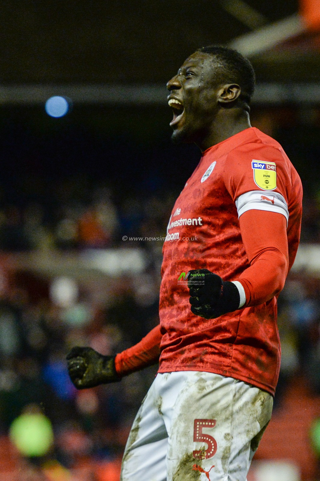 14th December 2019, Oakwell, Barnsley, England; Sky Bet Championship, Barnsley v Queens Park Rangers :Bambo Diaby (5) of Barnsley FC celebrates his goal to make it 5-2 

Credit: Dean Williams/News Images