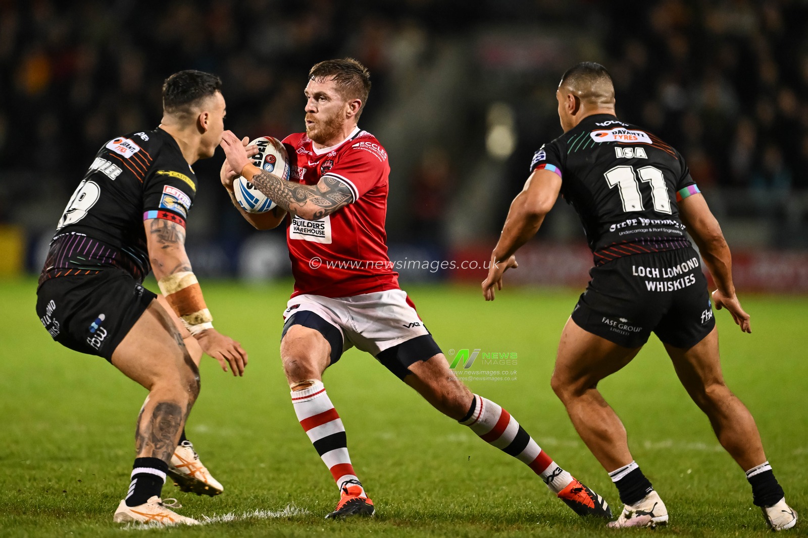 Marc Sneyd of Salford Red Devils is tackled by Tyler Dupree of Wigan Warriors during the Betfred Super League Round 5 match Salford Red Devils vs Wigan Warriors at Salford Community Stadium, Eccles, United Kingdom, 14th March 2024

(Photo by Craig Thomas/News Images)