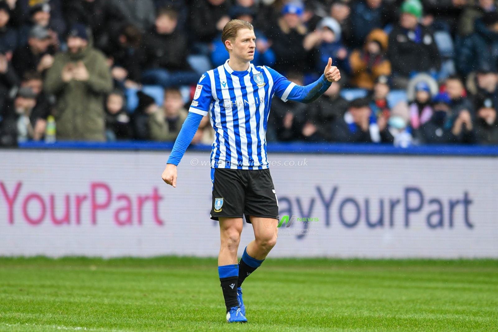 George Byers #14 of Sheffield Wednesday gives a thumbs up during the game