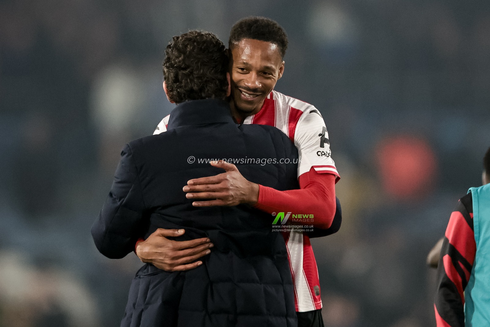 Keith Andrews manager of Brentford embraces Ethan Pinnock of Brentford during the Premier League match Leeds United vs Brentford at Elland Road, Leeds, United Kingdom on 21 March 2026

(Photo by Mark Cosgrove/News Images)