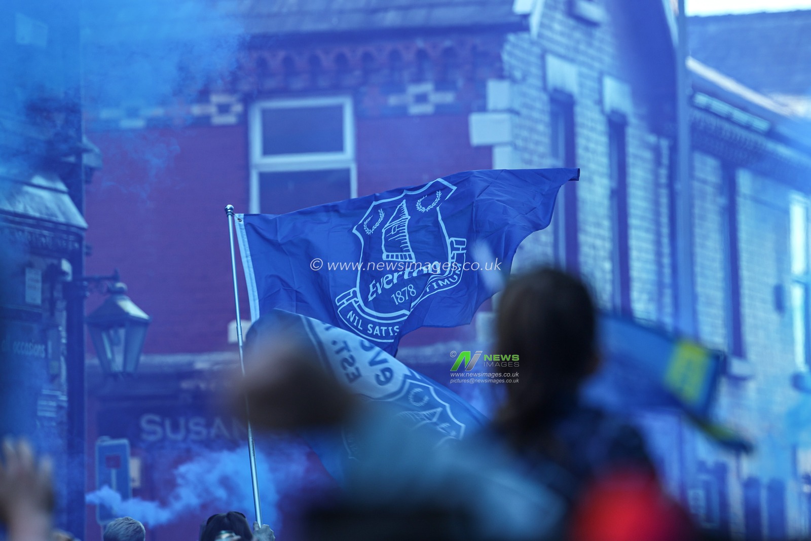Everton fan waves flag outside of Goodison Park ahead of Premier League match Everton vs Southampton at Goodison Park, Liverpool, United Kingdom, 18th May 2025

(Photo by Mark Cosgrove/News Images)