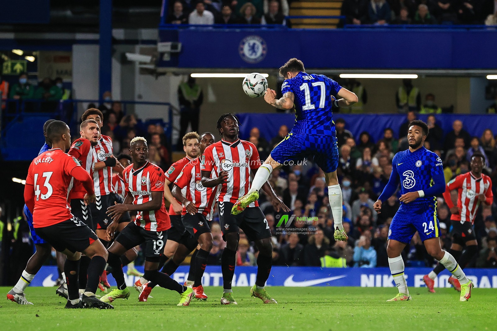 Saul Ã‘iguez #17 of Chelsea heads on goal but is saved by Fraser Forster #44 of Southampton