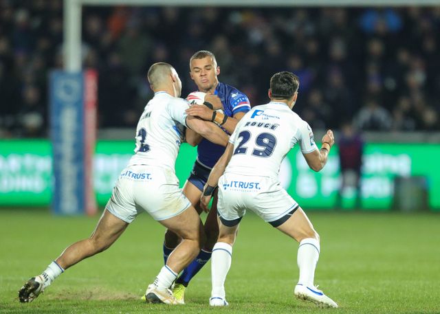 Corey Hall of Wakefield Trinity is tackled by Mathieu Jussaume of Toulouse Olympique and Cesar Rouge of Toulouse Olympique during the Betfred Super League Round 1 match Wakefield Trinity vs Toulouse Olympique at DIY Kitchens Stadium, Wakefield, United Kingdom on 14 February 2026

(Photo by Richard Bierton/News Images)