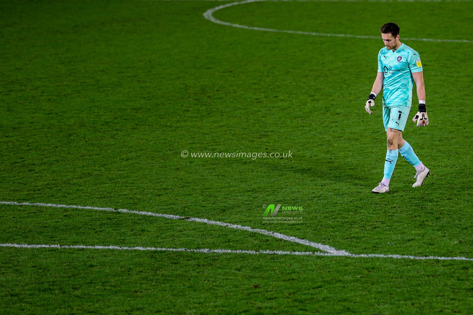 Jack Walton #1 of Barnsley walks off the pitch after the game