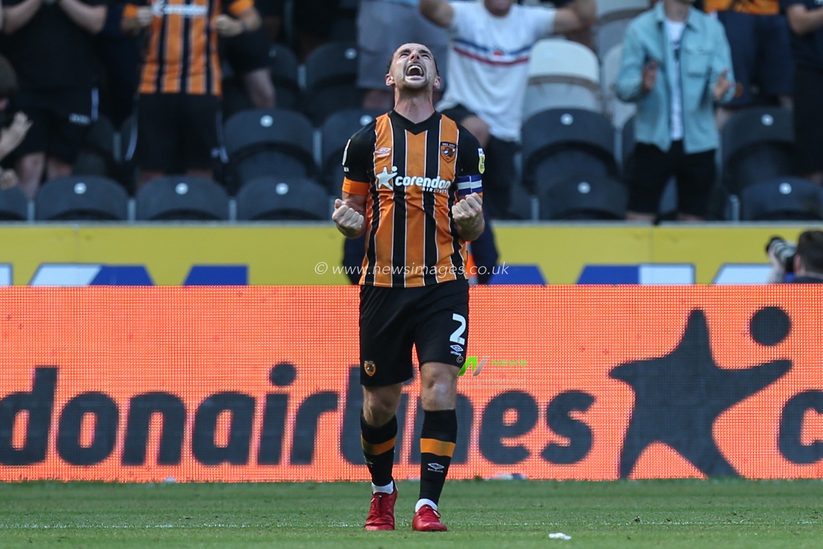 Lewie Coyle #2 of Hull City shows his happiness at the final whistle