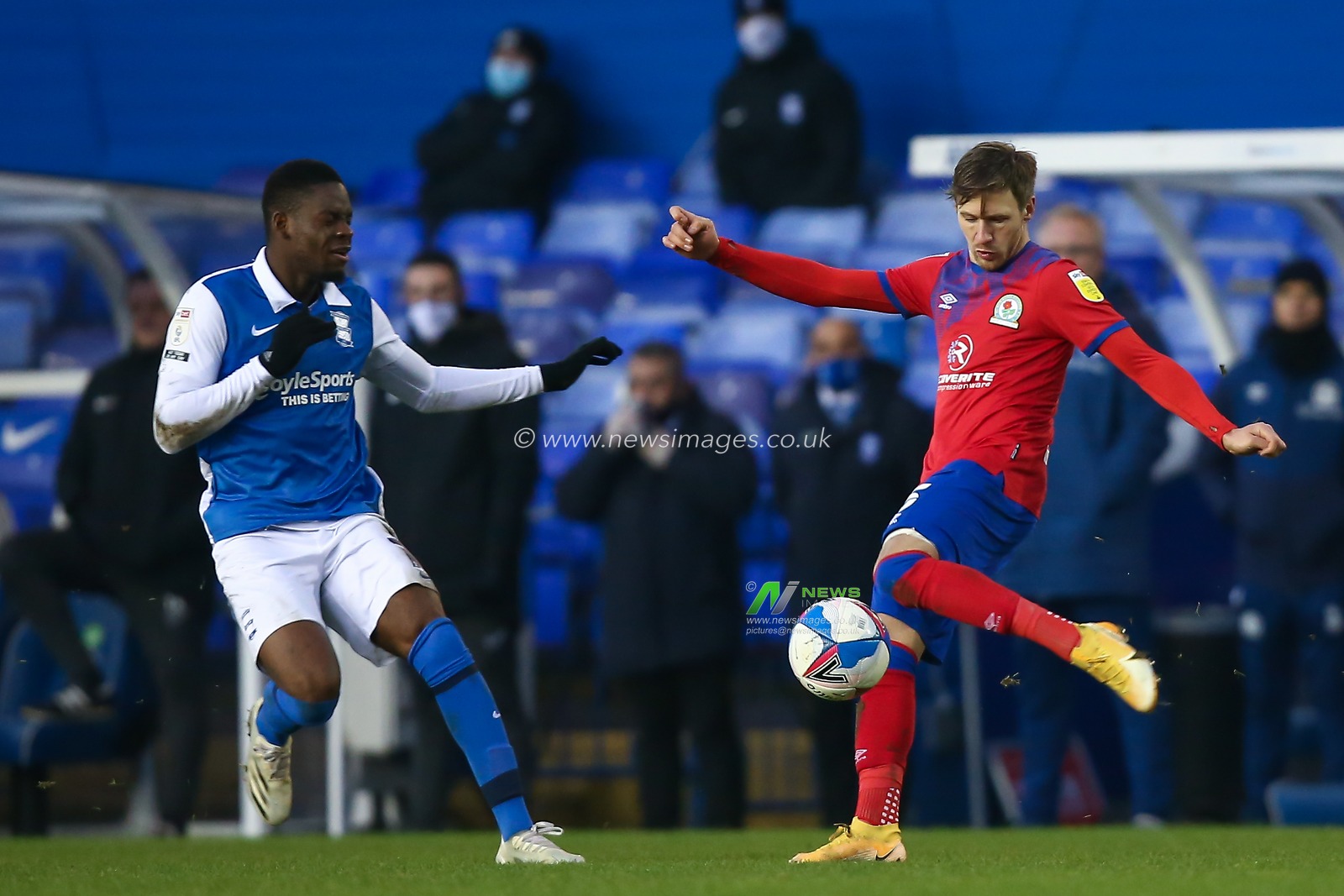 Barry Douglas #15 of Blackburn Rovers clears the ball