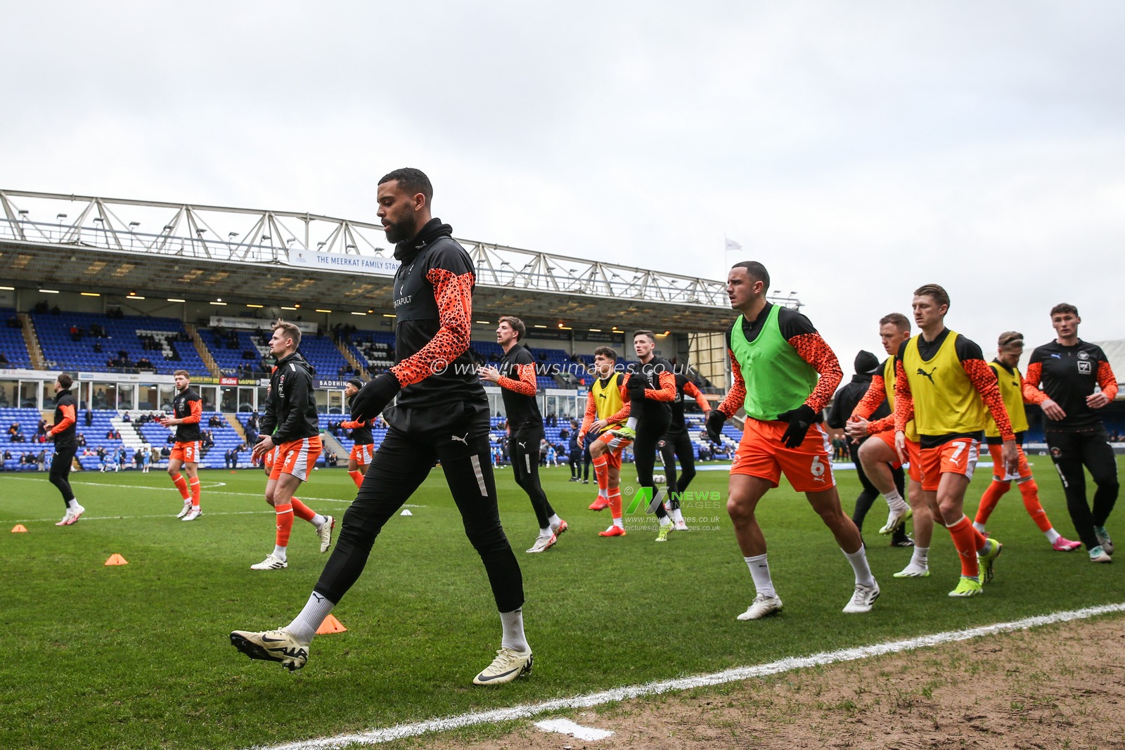Blackpool players during the pre-game warm up ahead of the Sky Bet League 1 match Peterborough United vs Blackpool at Weston Homes Stadium, Peterborough, United Kingdom, 17th February 2024

(Photo by Gareth Evans/News Images)