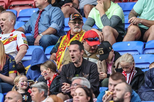 Catalans Dragons fans in attendance during the Betfred Super League round 20 match Wigan Warriors vs Catalans Dragons at The Brick Community Stadium, Wigan, United Kingdom, 25th July 2025

(Photo by Alfie Cosgrove/News Images)