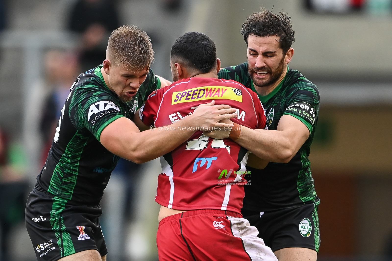 Charbel Tasipale of Lebanon is tackled by Toby King and Harry Rushton of Ireland during the Rugby League World Cup 2021 match Ireland vs Lebanon at Leigh Sports Village, Leigh, United Kingdom, 23rd October 2022

(Photo by Craig Thomas/News Images)