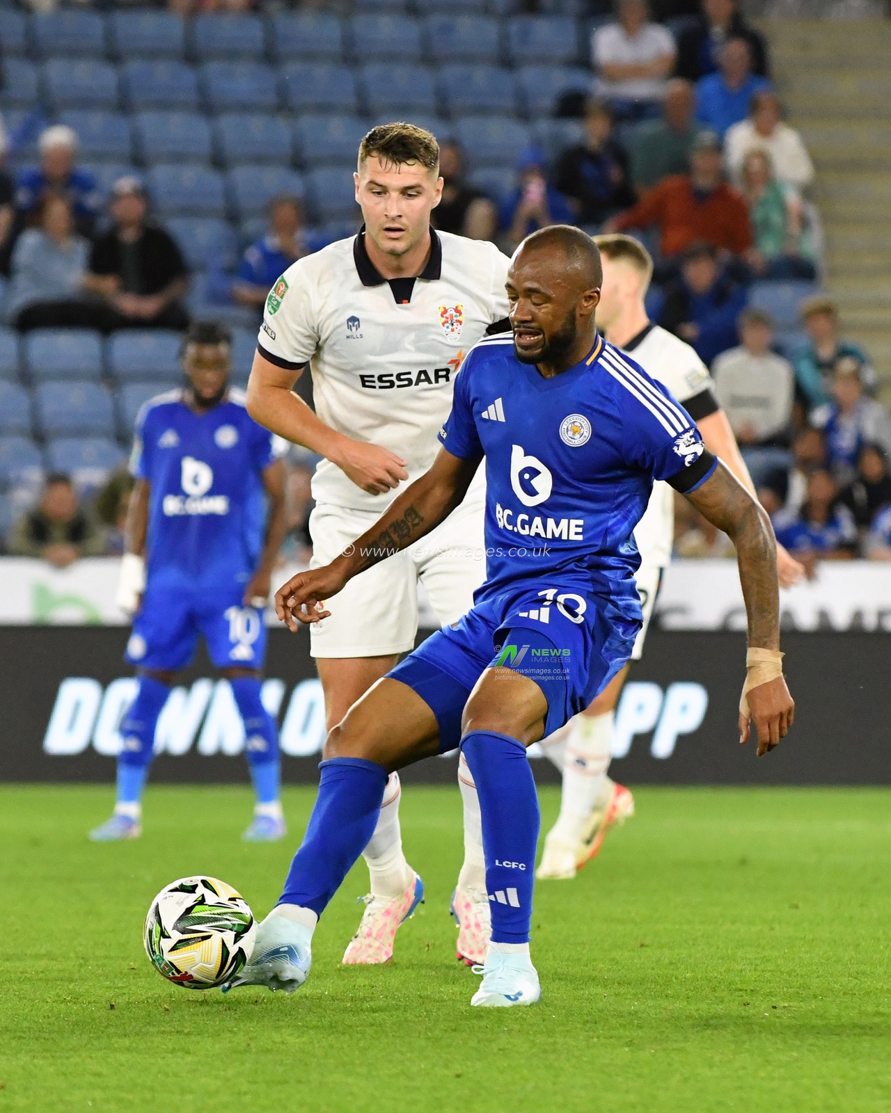 Jordan AYEW of Leicester City attacking with the ball  - Bran WALKER of Tranmere Rovers defending during the Carabao Cup match Leicester City vs Tranmere Rovers at King Power Stadium, Leicester, United Kingdom, 27th August 2024

(Photo by Mark Dunn/News Images)