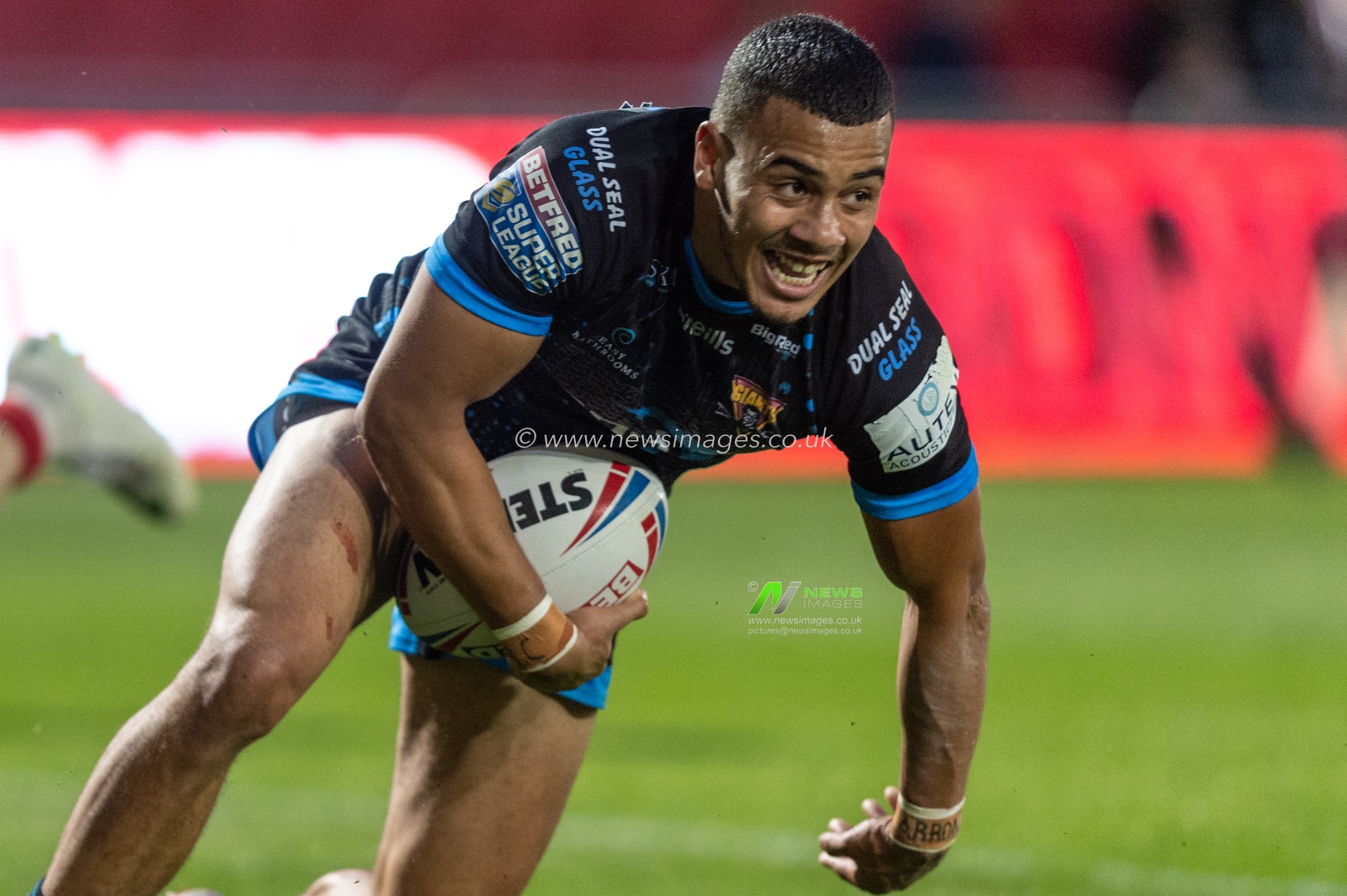 4th July 2019 ,  AJ Bell Stadium, Salford, England;  Betfred Super League, Round 21, Salford Red Devils vs Huddersfield Giants ; Darnell Mcintosh (1) of Huddersfield Giants celebrates scoring his try

Credit: Richard Long/News Images