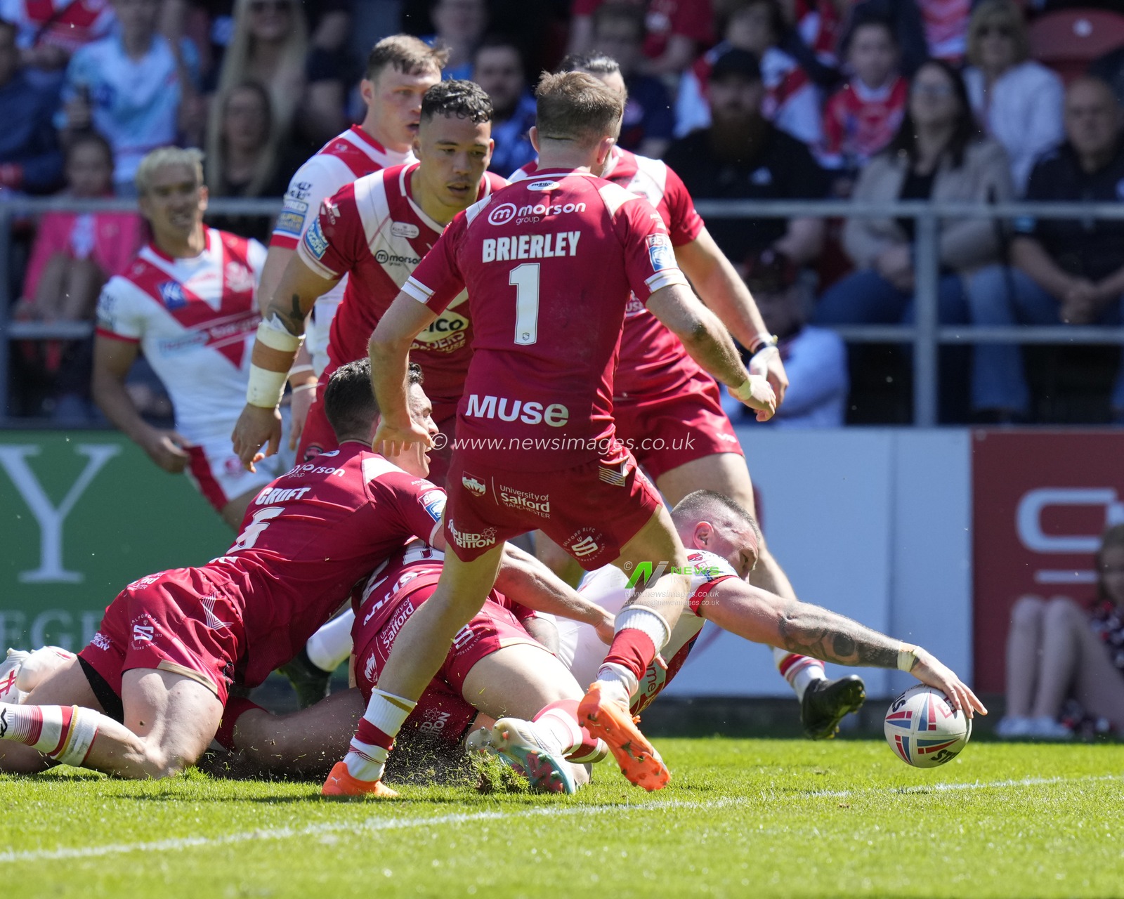 Curtis Sironen #16 of St. Helens stretches over to score a try during the Betfred Super League Round 12 match St Helens vs Salford Red Devils at Totally Wicked Stadium, St Helens, United Kingdom, 13th May 2023

(Photo by Steve Flynn/News Images)