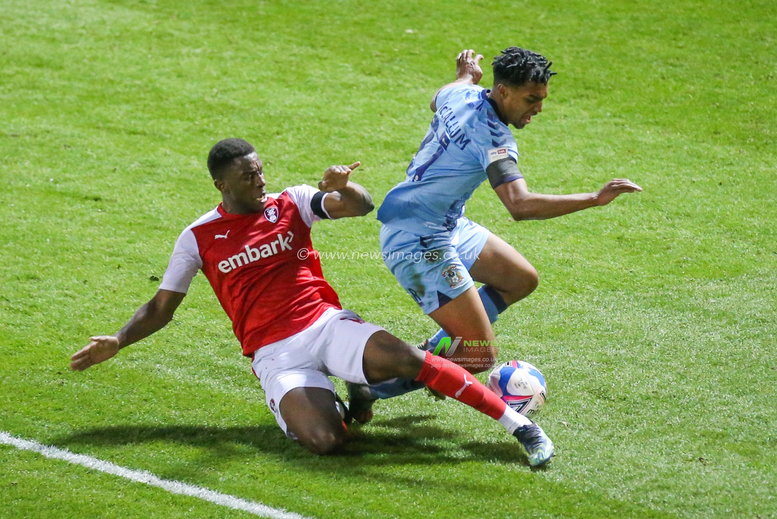 Sam McCallum #21 of Coventry City and Wes Harding #19 of Rotherham United battle for the ball during the game