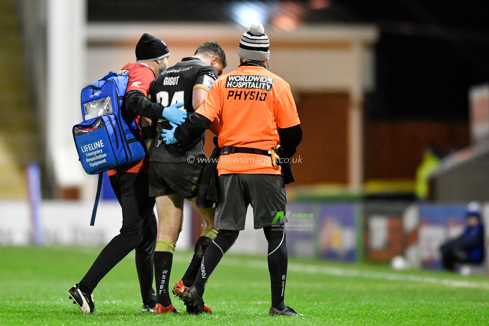 29th February 2020, Halliwell Jones Stadium, Warrington, England; Betfred Super League, Toronto Wolfpack v Saint Helens : Tony Gigot (24) of Toronto Wolfpack is helped from the pitch after picking up an injury