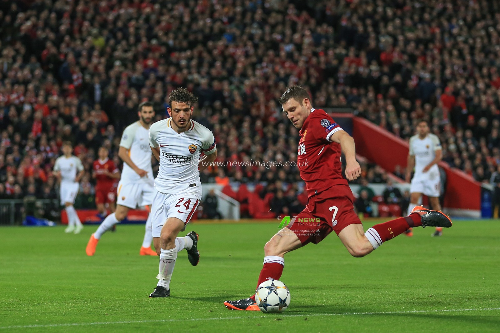 24th April 2018 , Anfield, Liverpool, England; UAFA Champions League Semi Final, first leg, Liverpool v Roma ; James Milner of Liverpool crosses the ball