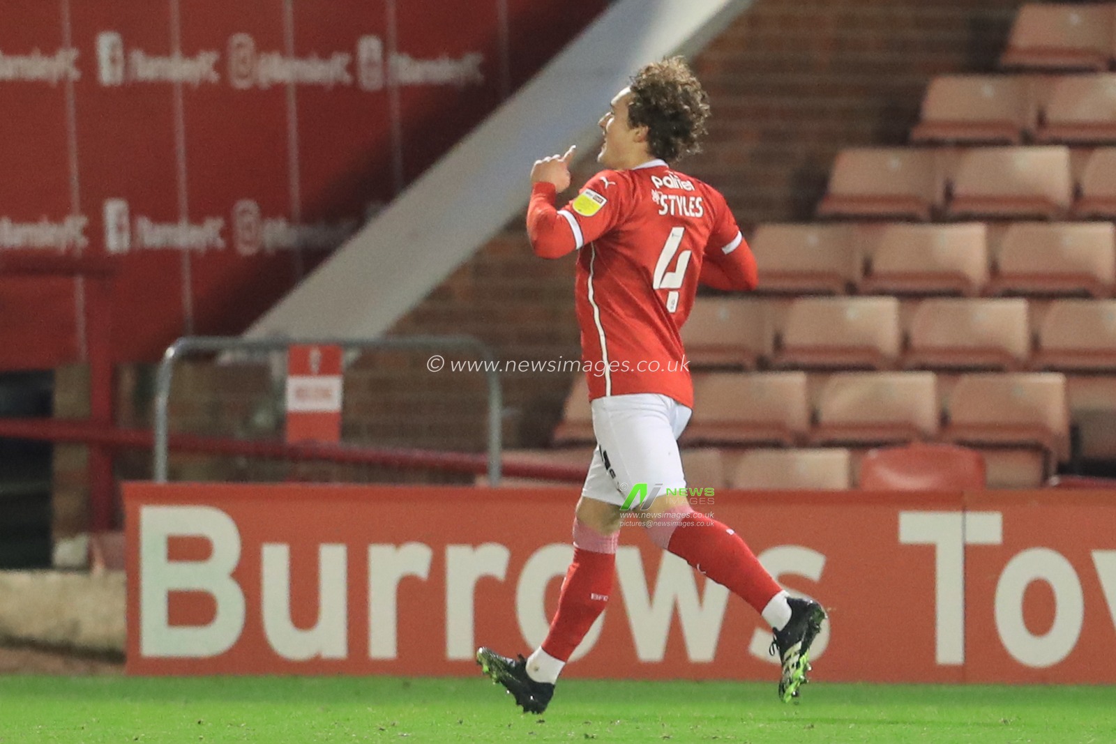 celebration Callum Styles #4 of Barnsley celebrates his goal to make it 1-0