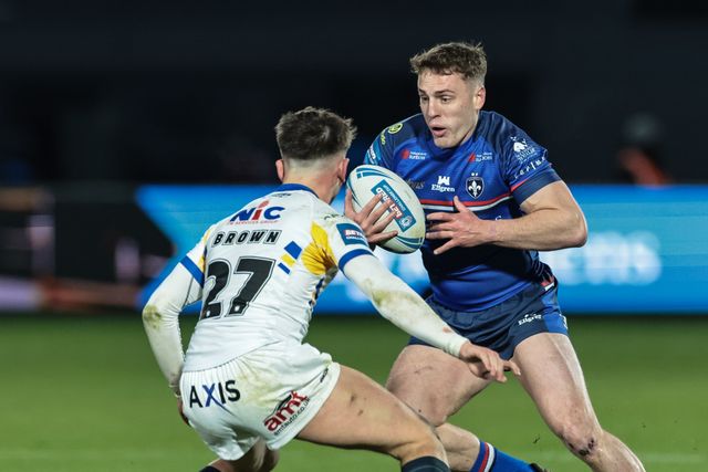 Jake Trueman of Wakefield Trinity looks for a way past George Brown of Leeds Rhinos during the Betfred Challenge Cup round 4 match Wakefield Trinity vs Leeds Rhinos at DIY Kitchens Stadium, Wakefield, United Kingdom on 13 March 2026

(Photo by Mark Cosgrove/News Images)