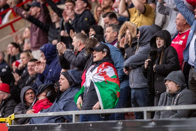 Wrexham fans during the Sky Bet League 1 match Wrexham vs Stockport County at SToK Cae Ras, Wrexham, United Kingdom, 22nd March 2025

(Photo by Nik Mesney/News Images)