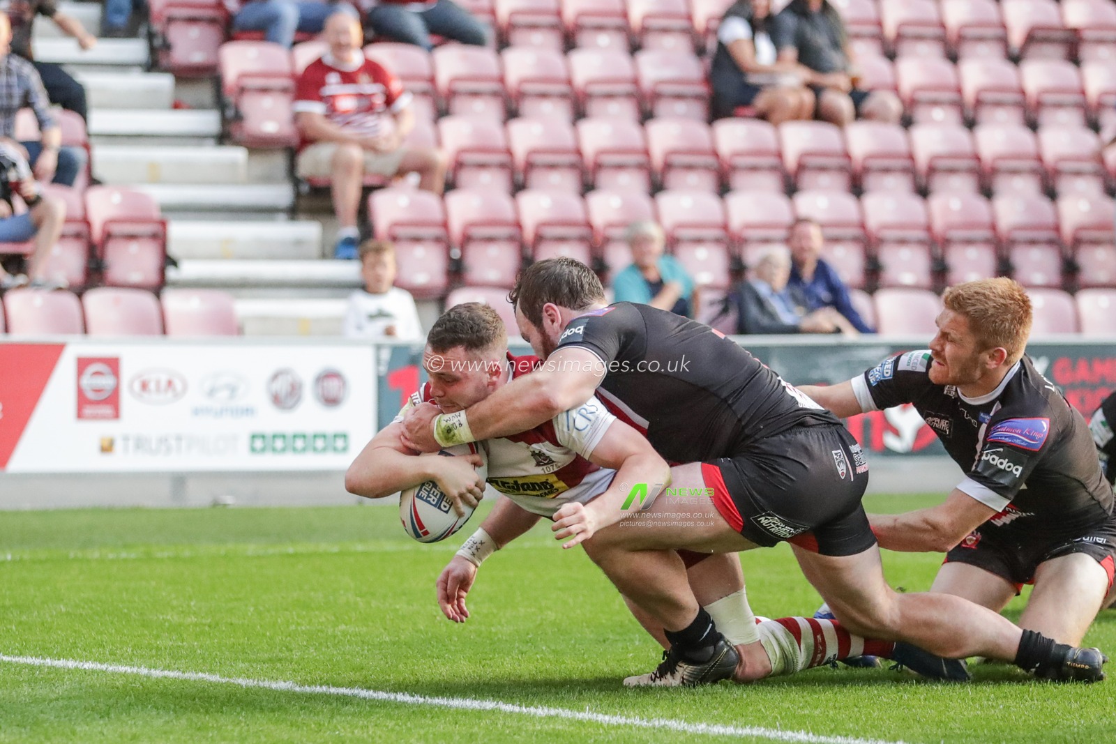 28th June 2019 , DW Stadium, Wigan, England;  Betfred Super League, Round 20, Wigan Warriors vs Salford Red Devils ; Liam Marshal (17) of Wigan Warriors goes over for a try 

Credit: Mark Cosgrove/News Images