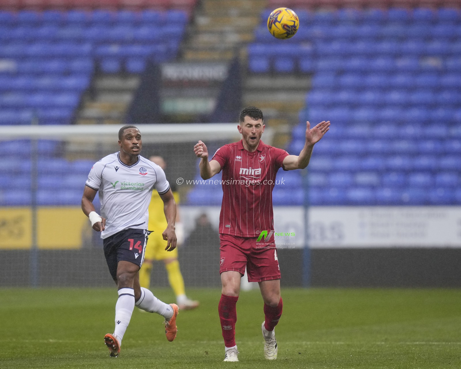 Tom Bradbury of Cheltenham Town heads clear during the Sky Bet League 1 match Bolton Wanderers vs Cheltenham Town at Toughsheet Community Stadium, Bolton, United Kingdom, 13th January 2024

(Photo by Steve Flynn/News Images)