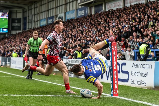 Matty Ashton of Warrington Wolves goes over for a try during the Betfred Super League round 7 match Warrington Wolves vs Leigh Leopards at The Halliwell Jones Stadium, Warrington, United Kingdom on 04 April 2026

(Photo by Alfie Cosgrove/News Images)