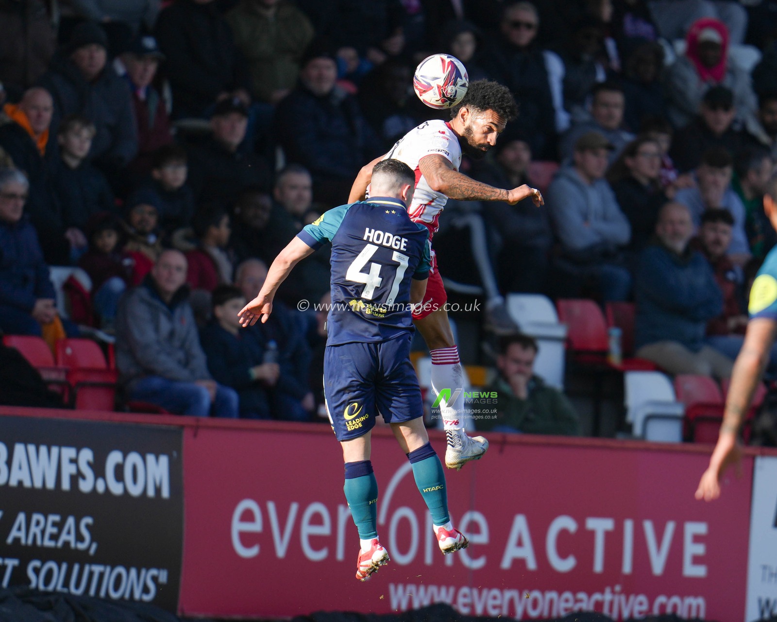 Jordan Roberts of Stevenage wins header against Joe Hodge of Huddersfield Town during the Sky Bet League 1 match Stevenage vs Huddersfield Town at Lamex Stadium, Stevenage, United Kingdom, 1st March 2025

(Photo by Harvey Murphy/News Images)