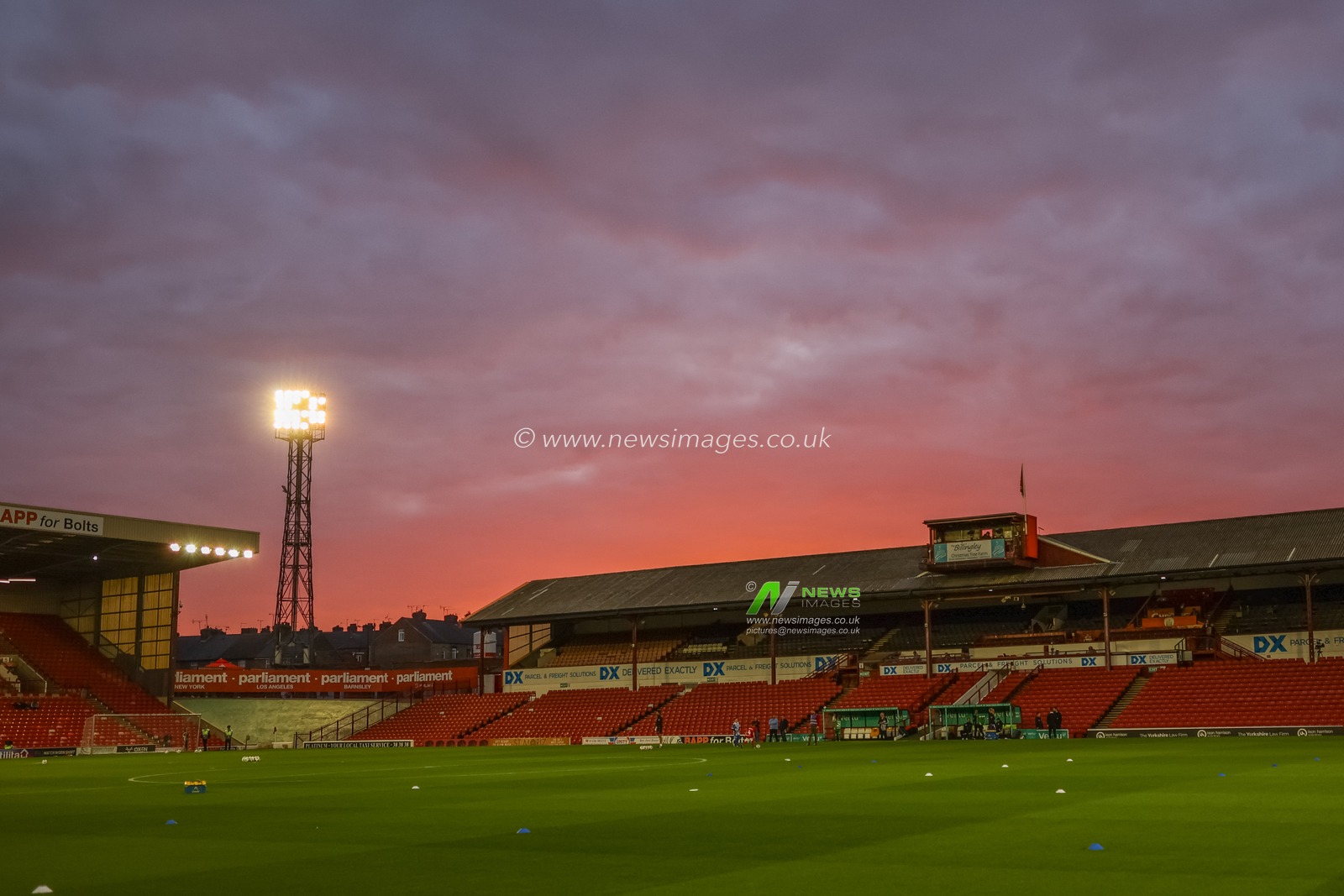 The sun sets over the West Stand as the floodlights are turned on during the Carabao Cup Round 3 match Barnsley vs Brighton and Hove Albion at Oakwell, Barnsley, United Kingdom, 23rd September 2025

(Photo by Mark Cosgrove/News Images)