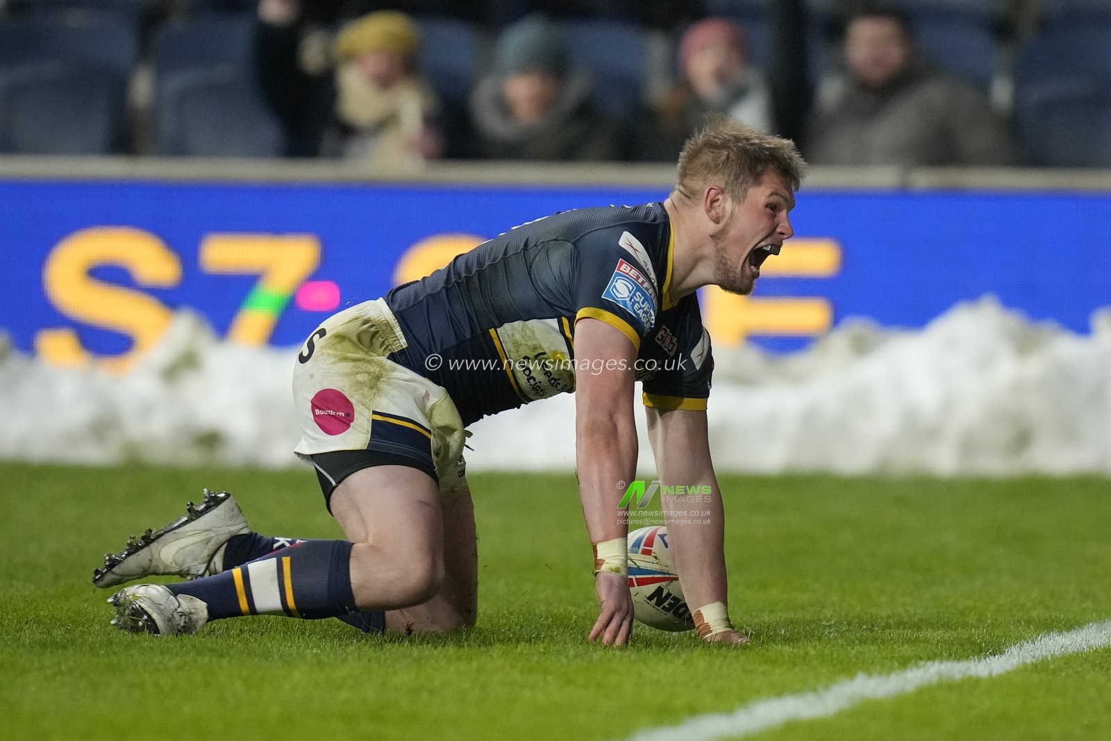 Tom Holroyd #18 of Leeds Rhinos celebrates scoring a try during the Betfred Super League Round 4 match Leeds Rhinos vs Wakefield Trinity at Headingley Stadium, Leeds, United Kingdom, 10th March 2023

(Photo by Steve Flynn/News Images)