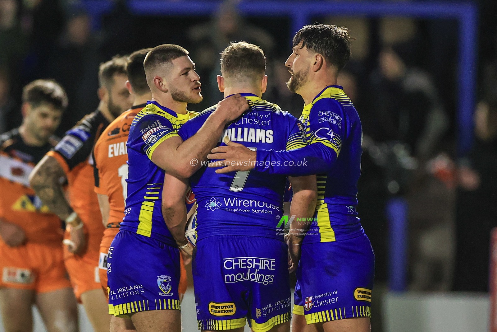 George Williams #7 of Warrington Wolves celebrates his try with Gareth Widdop #6 of Warrington Wolves