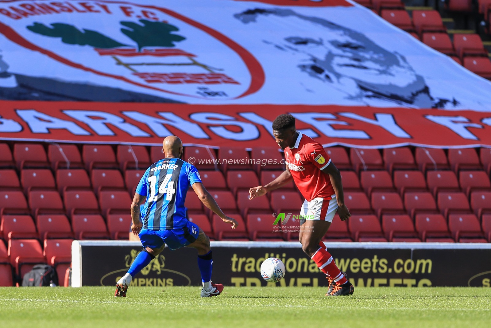 1st September 2018, Oakwell, Barnsley, England; Sky Bet League One, Barnsley v Gillingham ; Dimitri Cavare (12) of Barnsley puts Josh Parker (14) of Gillingham under pressure