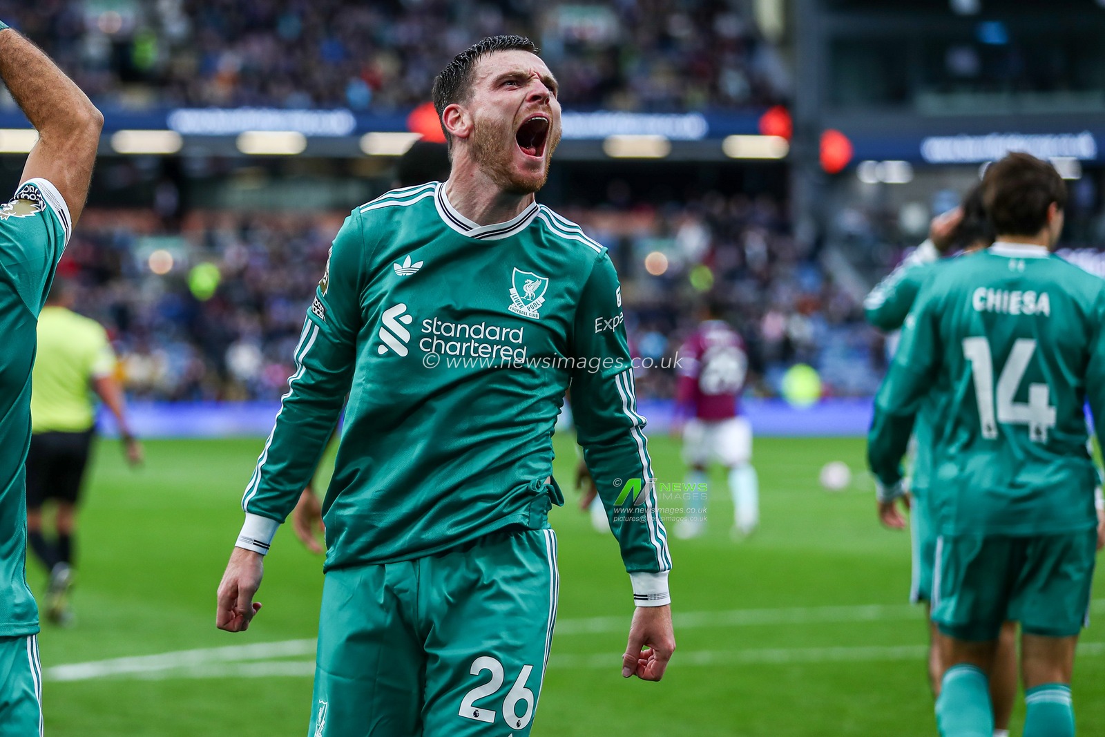 Andrew Robertson of Liverpool celebrates Mohamed Salah of Liverpool goal to make it 1-0 during the Premier League match Burnley vs Liverpool at Turf Moor, Burnley, United Kingdom, 14th September 2025

(Photo by Jorge Horsted/News Images)