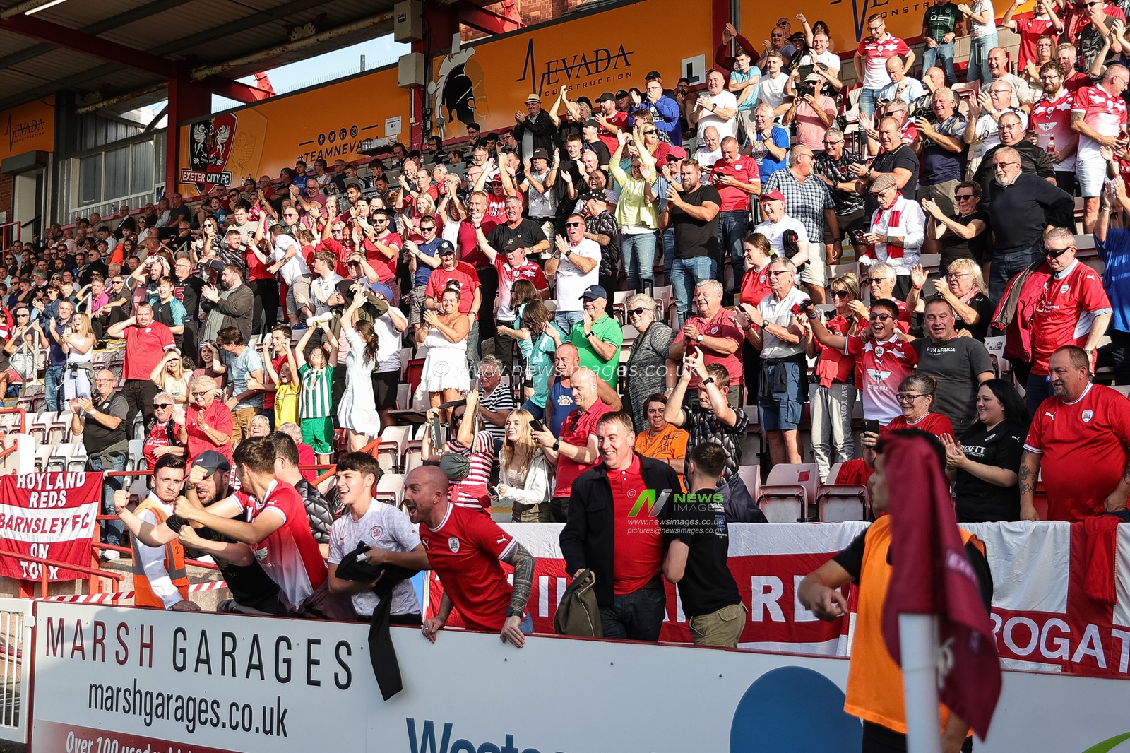 Barnsley fans celebrate the goal of John Mcatee #45 of Barnsley to make it 0-1 during the Sky Bet League 1 match Exeter City vs Barnsley at St James' Park, Exeter, United Kingdom, 7th October 2023

(Photo by Mark Cosgrove/News Images)