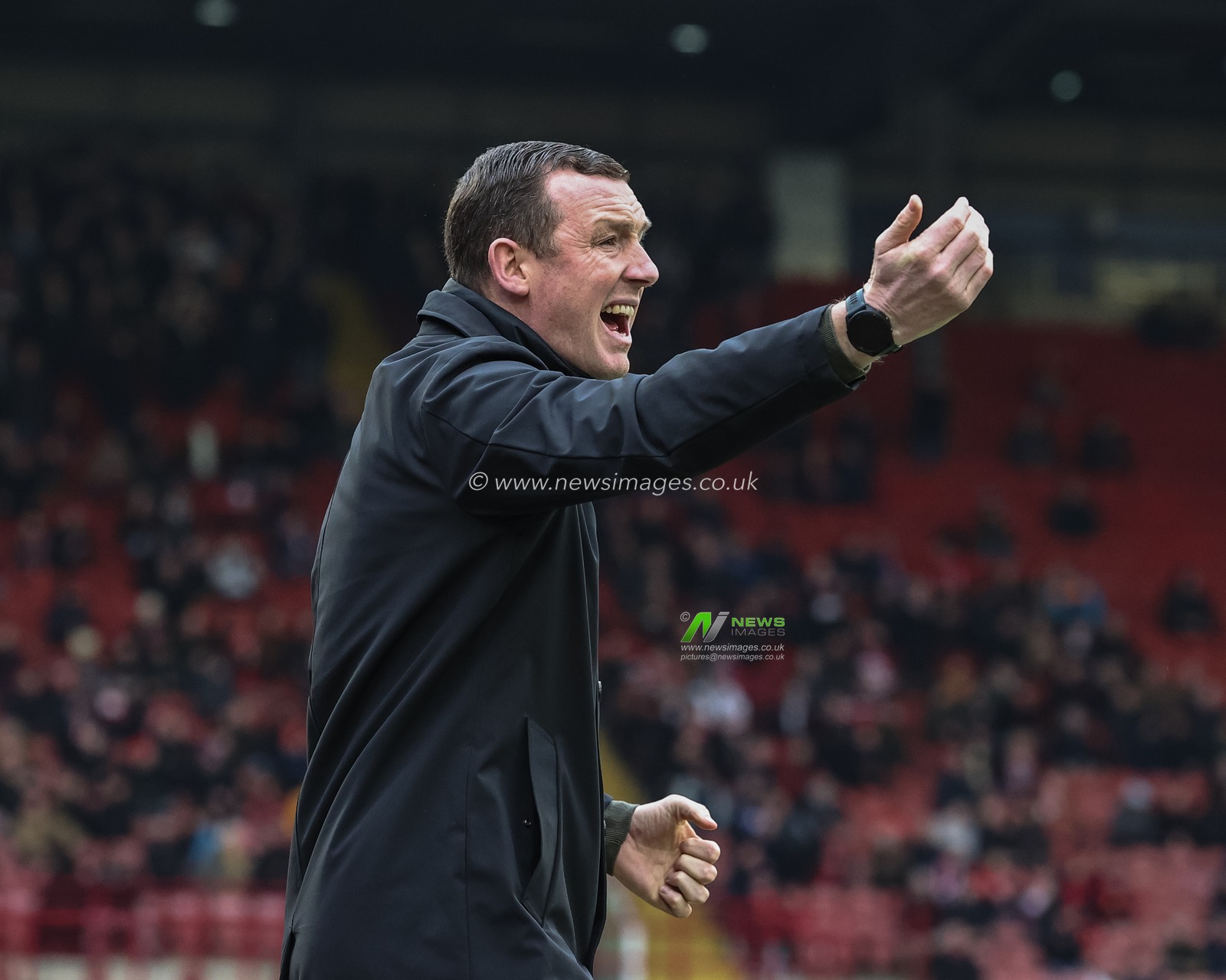 Neill Collins Head coach of Barnsley shouts instructions during the Sky Bet League 1 match Barnsley vs Leyton Orient at Oakwell, Barnsley, United Kingdom, 10th February 2024

(Photo by Mark Cosgrove/News Images)